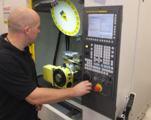 (Photo reference ETG Renishaw Matrix PR3) The machining set up on a RoboDrill D21L 3 axis machining centre fitted with a 4/5 axis rotary table.